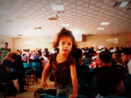 I shot this photo inside the Rafah hall where the travellers wait to hear their names called out